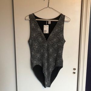 Sparkly low-cut bodysuit